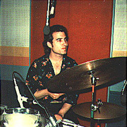 Mike Garson tries the drums